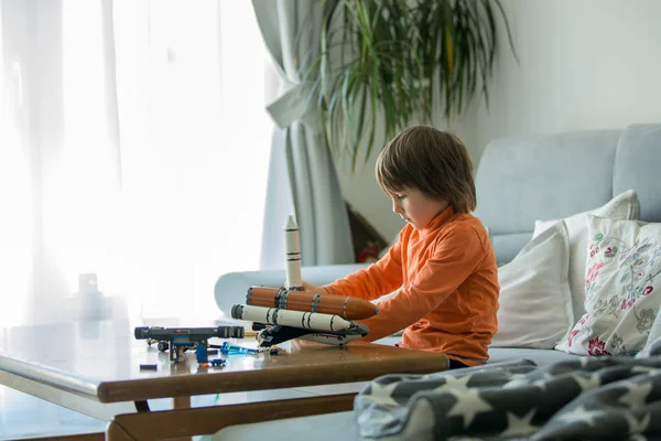 Cute little child, preschool boy, playing at home in living room — Stock Photo, Image