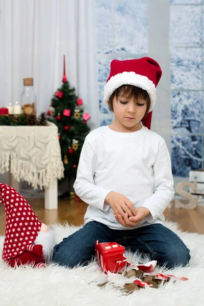 Sweet little boy, breaking his piggy bank to buy present for mom — Stock Photo, Image