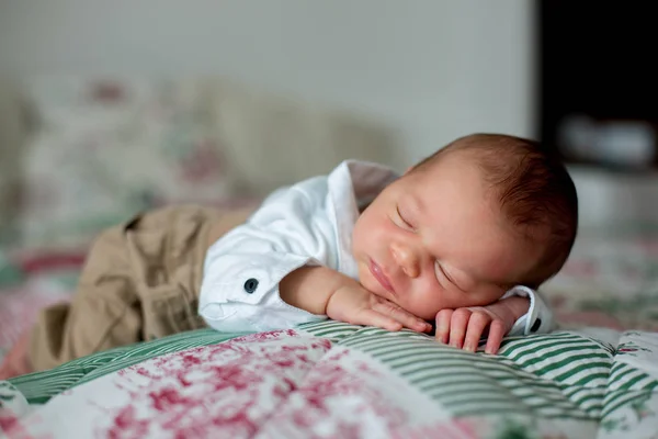 Beautiful little newborn baby boy, dressed as little gentlemen, — Stock Photo, Image