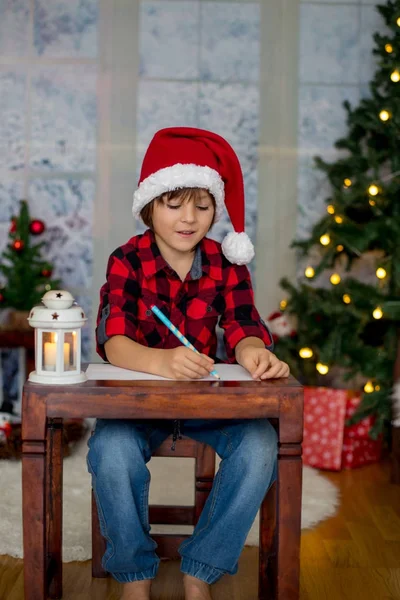 Adorable little boy, writing letter to Santa — Stock Photo, Image
