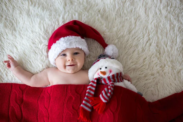 Christmas portrait of cute little newborn baby boy, wearing sant — Stock Photo, Image