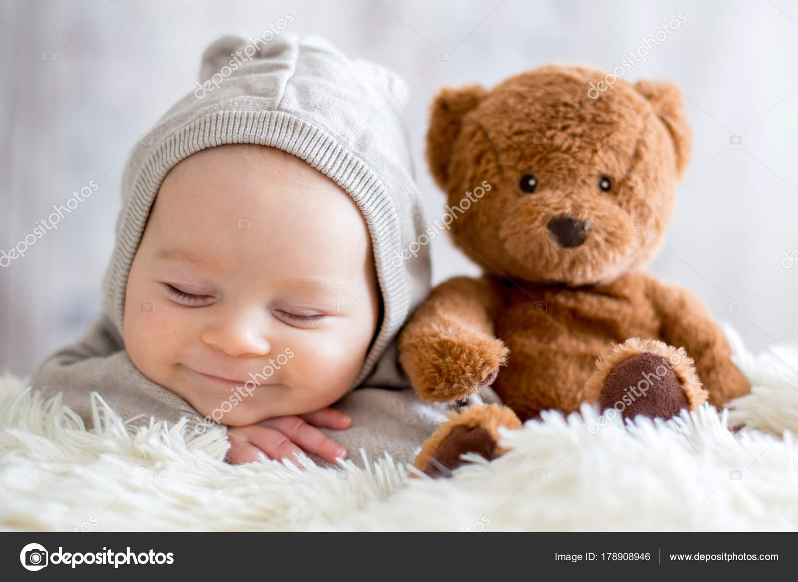 child and teddy bear