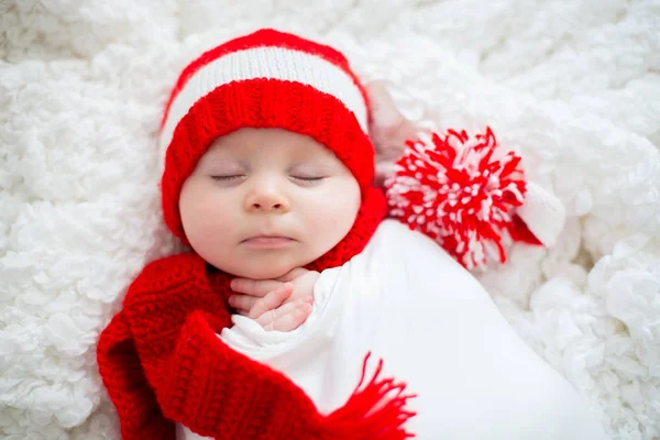 Christmas portrait of cute little newborn baby boy, wearing sant — Stock Photo, Image