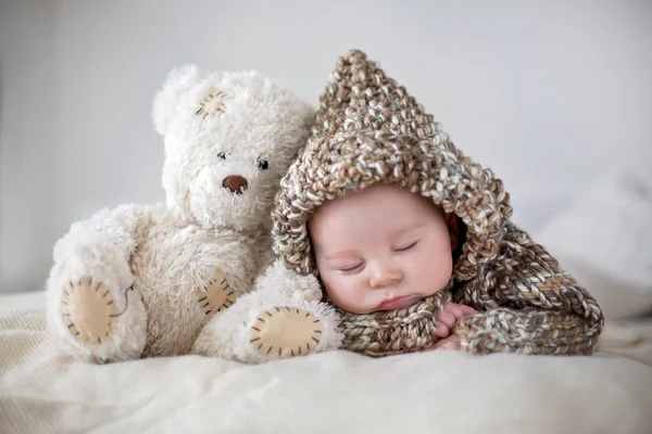 Little baby boy , sleeping at home with soft teddy bear toys — Stock Photo, Image