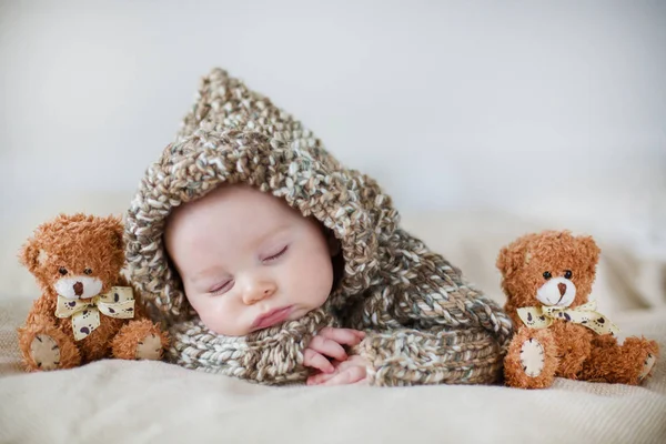 Little baby boy , sleeping at home with soft teddy bear toys — Stock Photo, Image