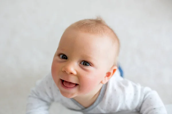 Portrait of cute little toddler child shot from above, baby boy — Stock Photo, Image