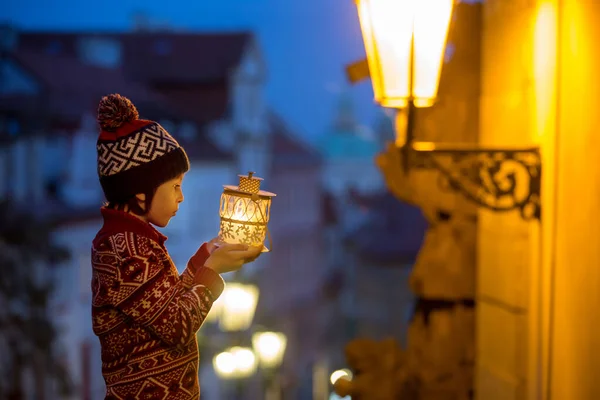 Beautiful preschool child, holding lantern, casually dressed, lo — Stock Photo, Image