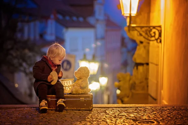 Beautiful toddler child with lantern and teddy bear, casually dr — Stock Photo, Image