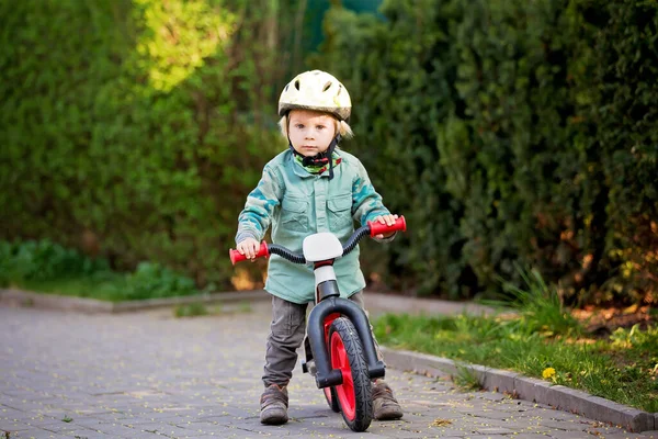 Blonde Little Toddler Child Riding Bike Wearing Helmet Playing Playground — Stock Photo, Image