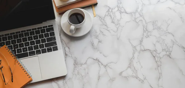 Top view of modern stylish workplace with laptop computer and office supplies on marble table background — Stock Photo, Image