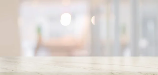 Empty marble desk with copy space and blurred office background