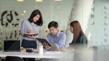 Group of UI application developer working on their project together 