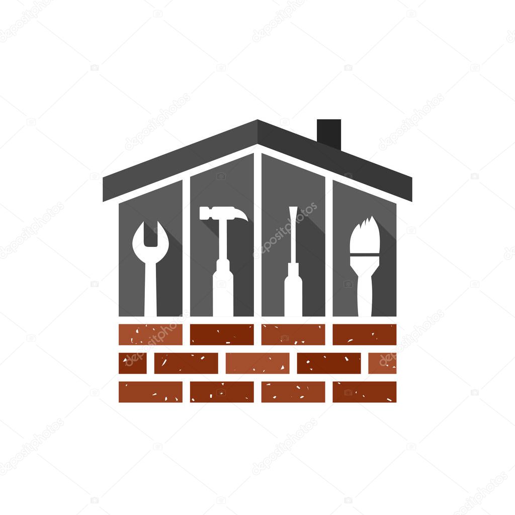 Building and construction concept with house, brick wall and related tools