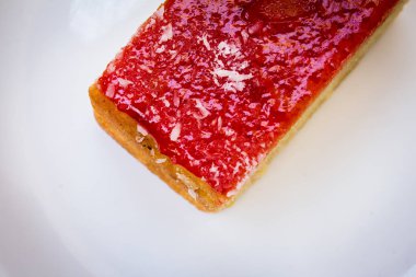 Close view of honey cake which is a popular cake sold in bakeries in south india.