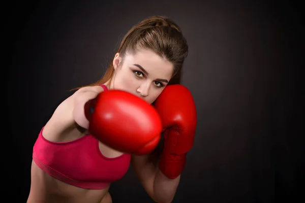 beautiful girl with the red boxing gloves