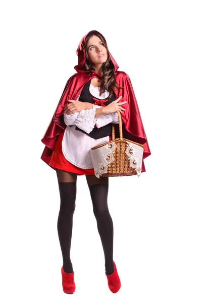 Une fille en costume de carnaval avec une casquette rouge et un panier — Photo