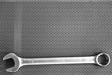 bir arka plan üzerinde büyük somun anahtarı