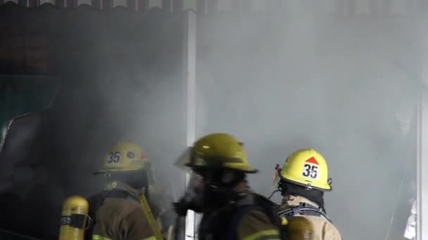 Fire Fighters Break Windows Store — Stock Video
