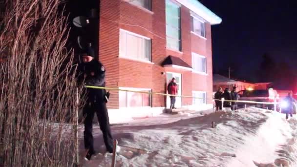 Young Police Officers Unrolling Crime Tape Winter — Stock Video