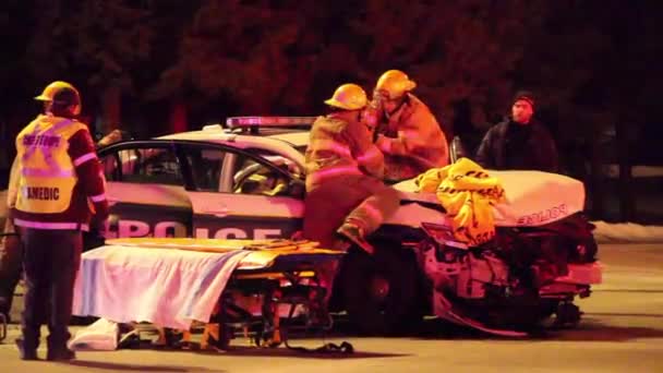 Fire Fighters Break Windshield Police Cruiser Proceed Extrication Two Police — Stock Video