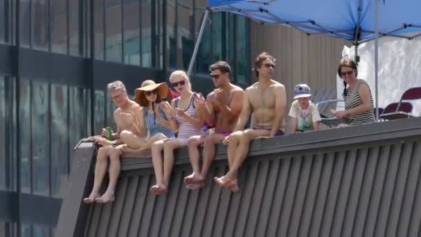 Gay Pride Men Women Sitting Rooftop Clapping — Stock Video