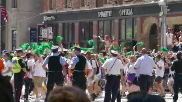 Gay Parade People Holding Green Accessory Walking Cops — Stock Video