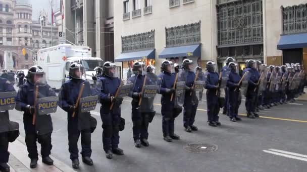 Riot Police Officers Wooden Batons March Together — Stock Video