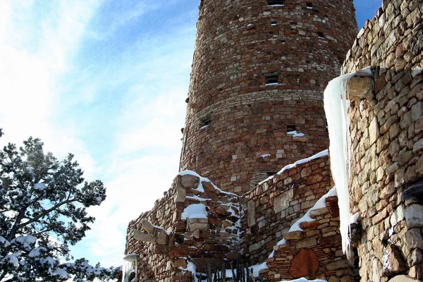 Icicles on the walls of the Watchtower at the Desert View Point on a sunny winter day, Grand Canyon, AZ, USA