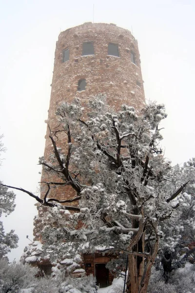 the Watchtower at the Desert View Point on a snowy winter day, Grand Canyon, AZ, USA