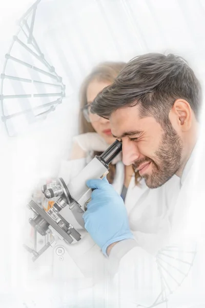 biological research scientist using microscope in laboratory on white background with overlay of DNA strain