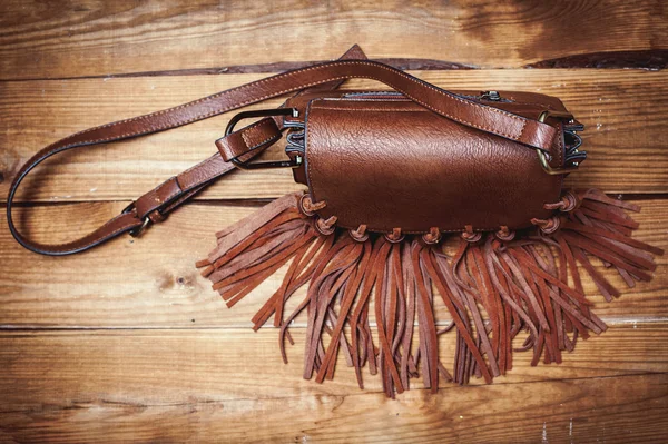 Stylish brown bag with fringe — Stock Photo, Image