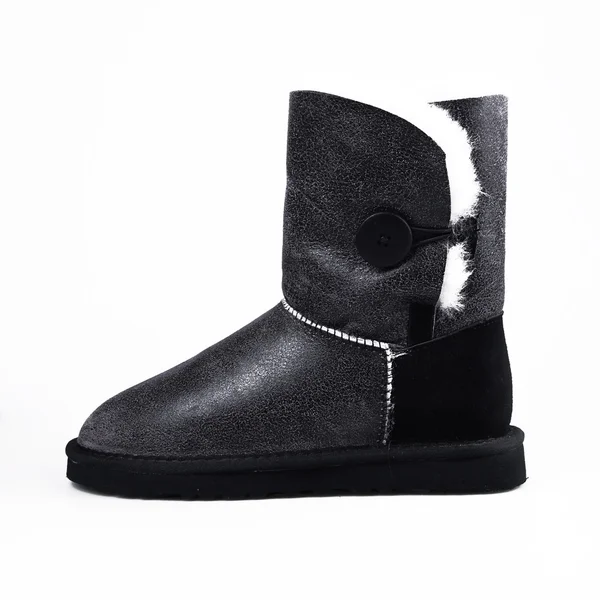 Inverno sapatos pretos sobre branco — Fotografia de Stock