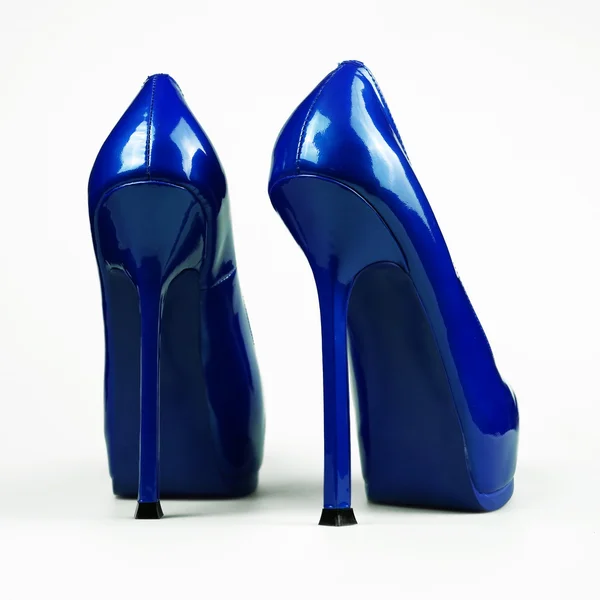 Weibliche blaue Schuhe — Stockfoto
