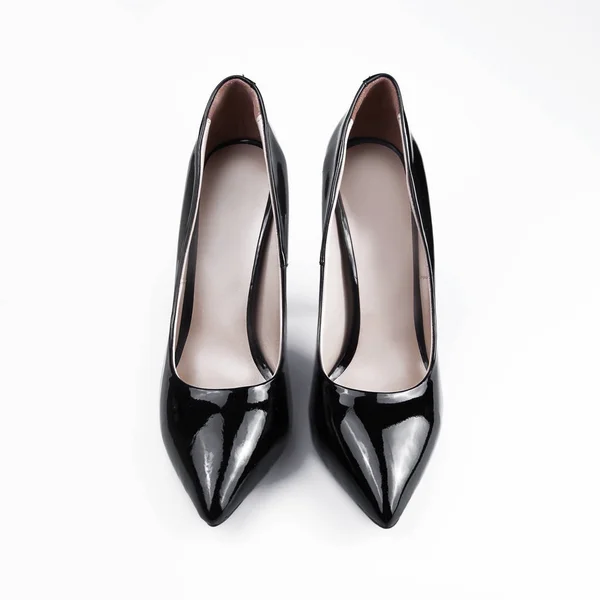 Mulheres pretas sapatos isolados no fundo branco — Fotografia de Stock