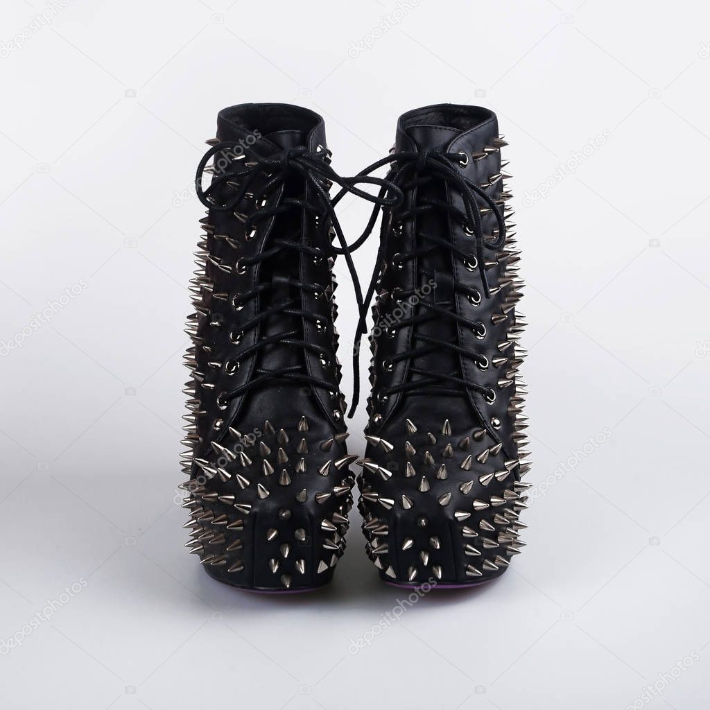 Stylish black shoes with spikes