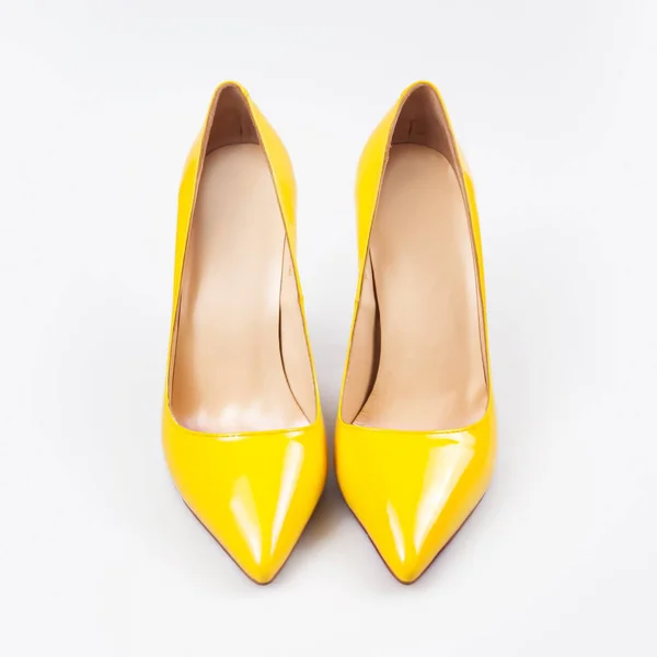 Female yellow shoes — Stock Photo, Image
