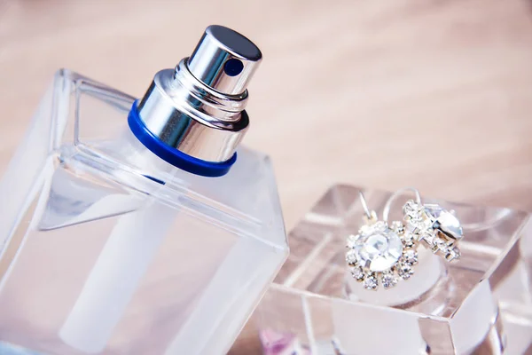 Perfume bottle with accessories — Stock Photo, Image