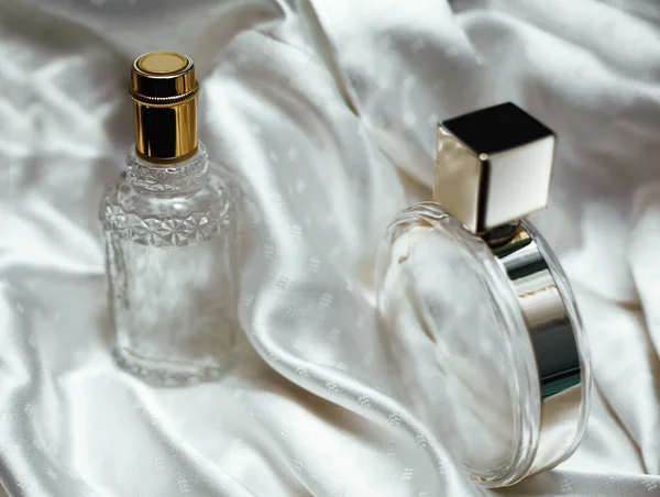 Two bottle of perfume on a white background — Stock Photo, Image