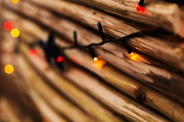 Illuminated garland hanging on a wall — Stock Photo, Image