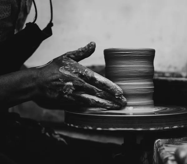 Hands working on pottery wheel — Stock Photo, Image