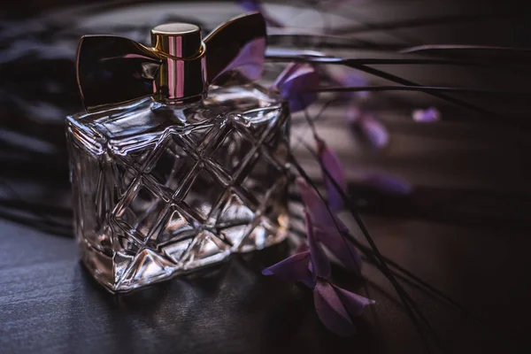 Female perfume with flowers — Stock Photo, Image