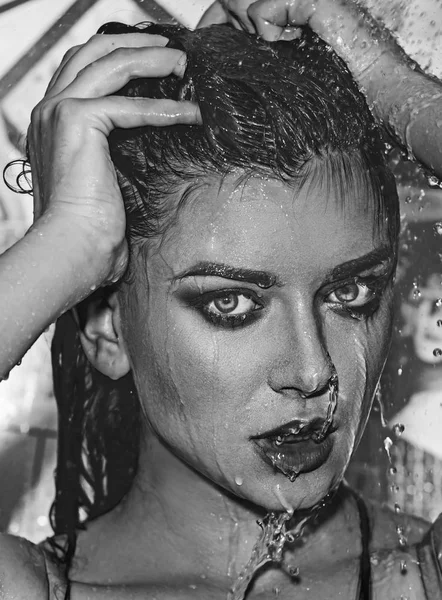 Portrait of wet girl at shower — Stockfoto