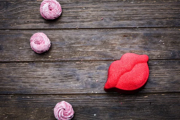 Cake in the form of a pink lips. St. Valentine\'s Day. Mousse cak