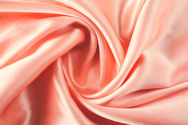 Smooth elegant pink silk or satin texture can use as wedding bac