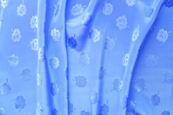 缎纹织物明亮的蓝色色彩是波为背景 — 图库照片