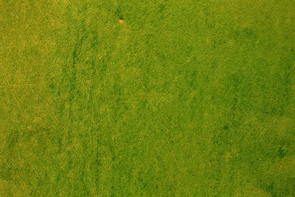 Textura de fundo de parede de ferro verde enferrujado vintage com muitos la — Fotografia de Stock