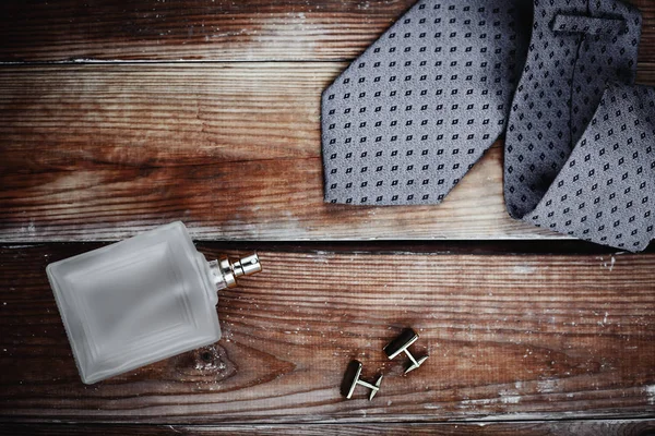 Men's fashion accessories. Perfume with tie and cuff — Stock Photo, Image