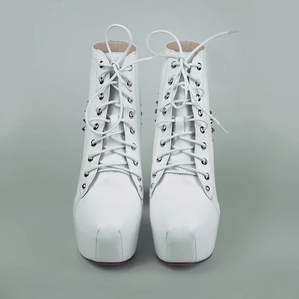 Female white leather boots — Stock Photo, Image