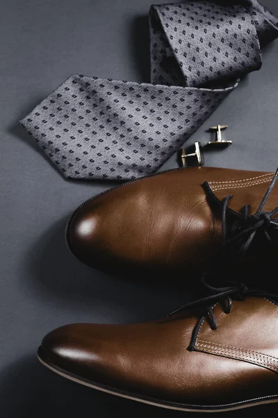 Man's style. Men's Accessories. Shoes with tie and cuff