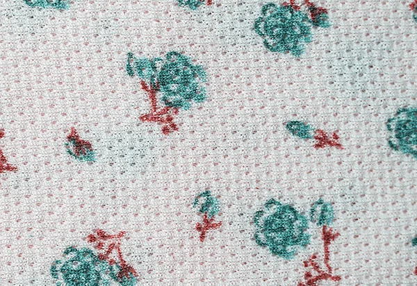Tkanina tło z małymi niebieskimi kwiatami — Zdjęcie stockowe